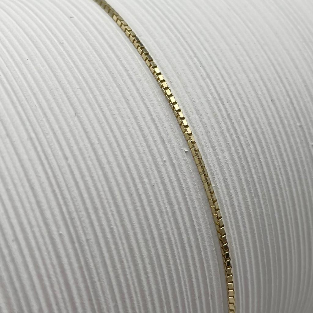 14K Yellow gold box chain with lobster clasp.